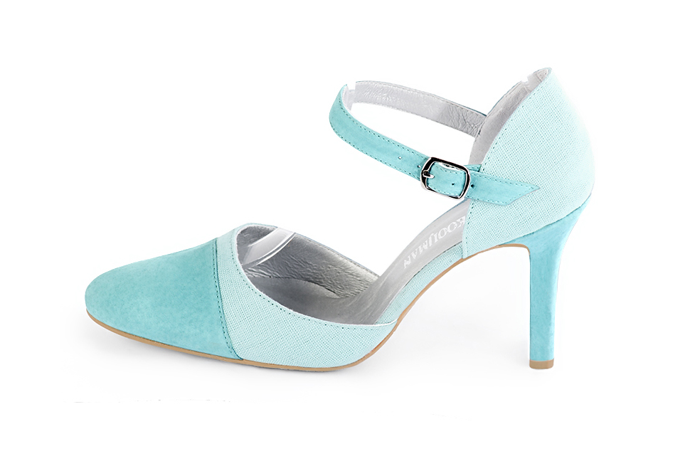 French elegance and refinement for these aquamarine blue dress open side shoes, with an instep strap, 
                available in many subtle leather and colour combinations. Its high vamp and fitted strap will give you good support.
To personalize or not, according to your inspiration and your needs.  
                Matching clutches for parties, ceremonies and weddings.   
                You can customize these shoes to perfectly match your tastes or needs, and have a unique model.  
                Choice of leathers, colours, knots and heels. 
                Wide range of materials and shades carefully chosen.  
                Rich collection of flat, low, mid and high heels.  
                Small and large shoe sizes - Florence KOOIJMAN